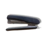 Tick Stapler SM-0021 stapling documents on desk