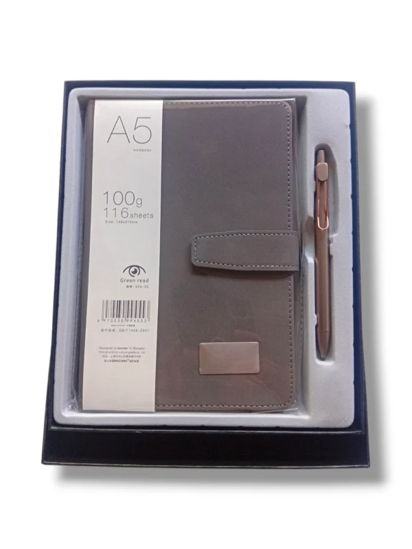 Fancy diary with pen open on a writing desk