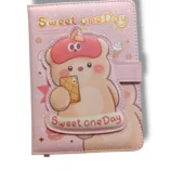 Fancy Dairy 32K1016-11 milk bottle on a rustic wooden table.