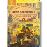 Master illusionist David Copperfield performing a magic trick on stage.